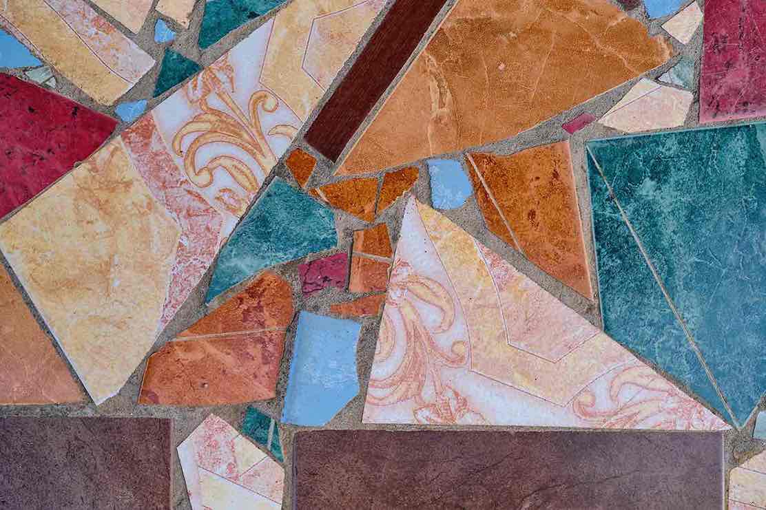 Different tile types for kitchen splashbacks including ceramic, porcelain and mosaic options